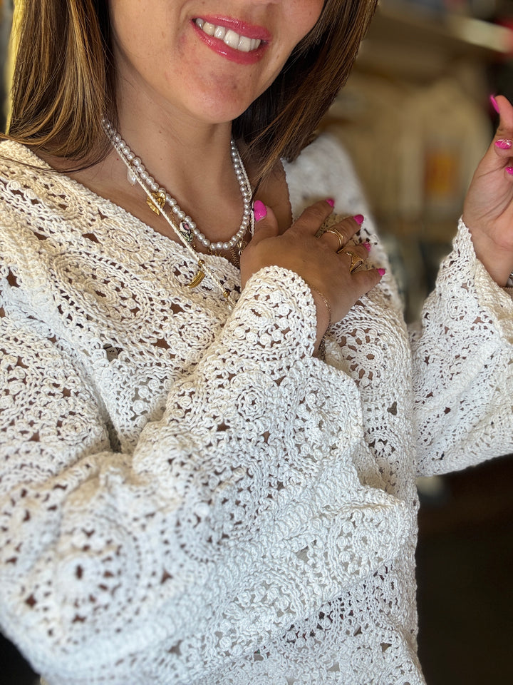 Pull en broderie anglaise