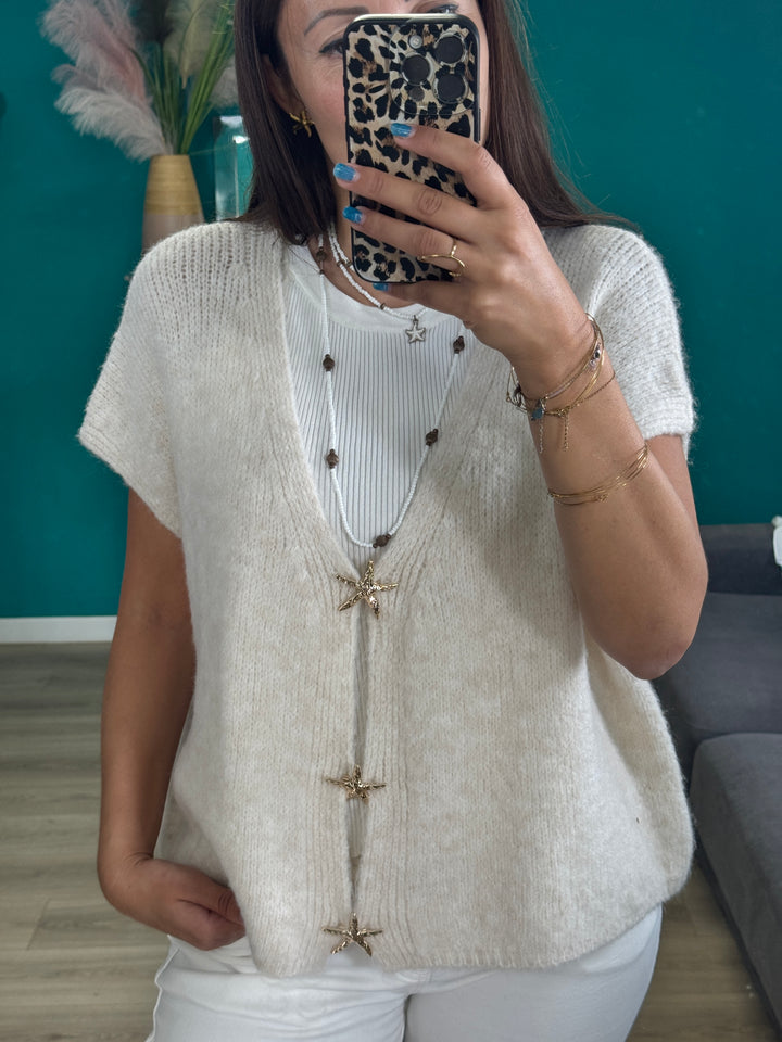 Gilet sans manches blanc cassé avec broches étoiles